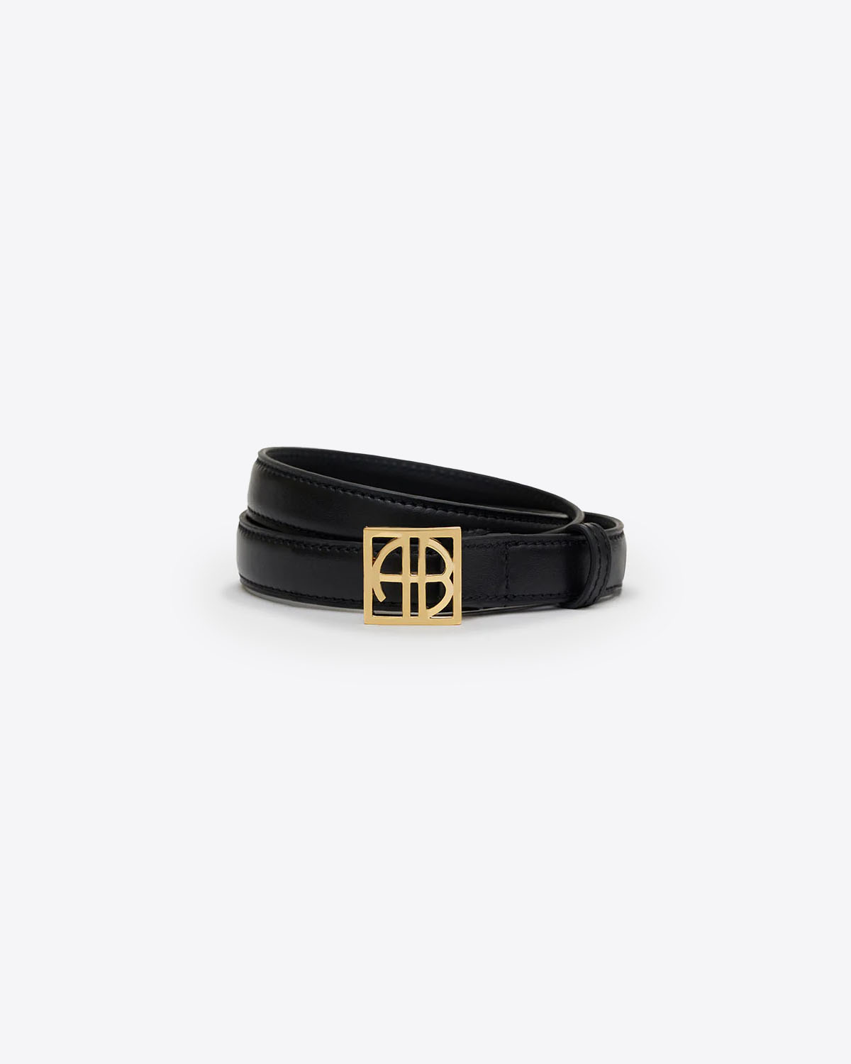 Ceinture Monogramme Anine Bing en cuir noir. 