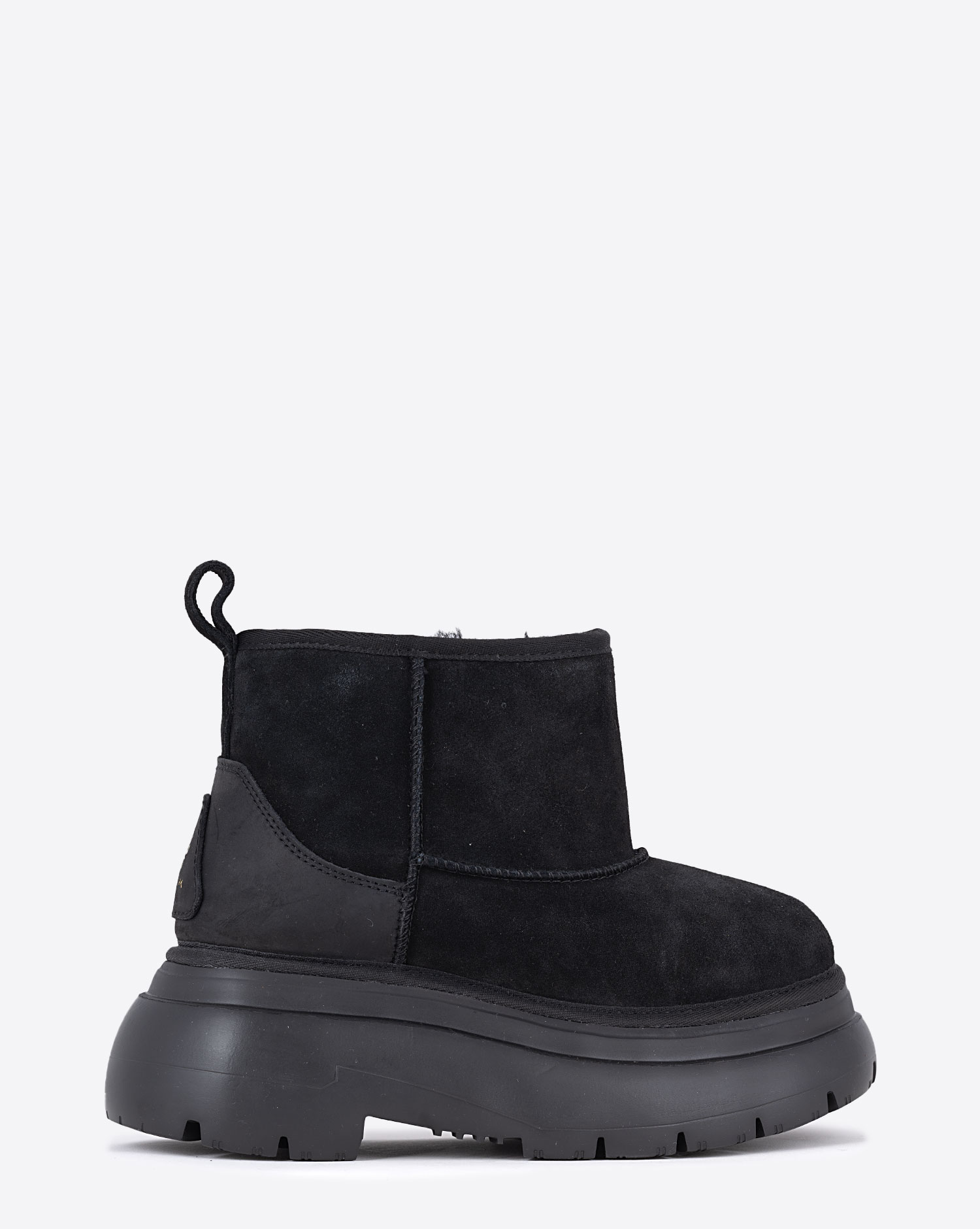 Boots courtes fourrée Chunky Shearling Boot noir R13. Profil.