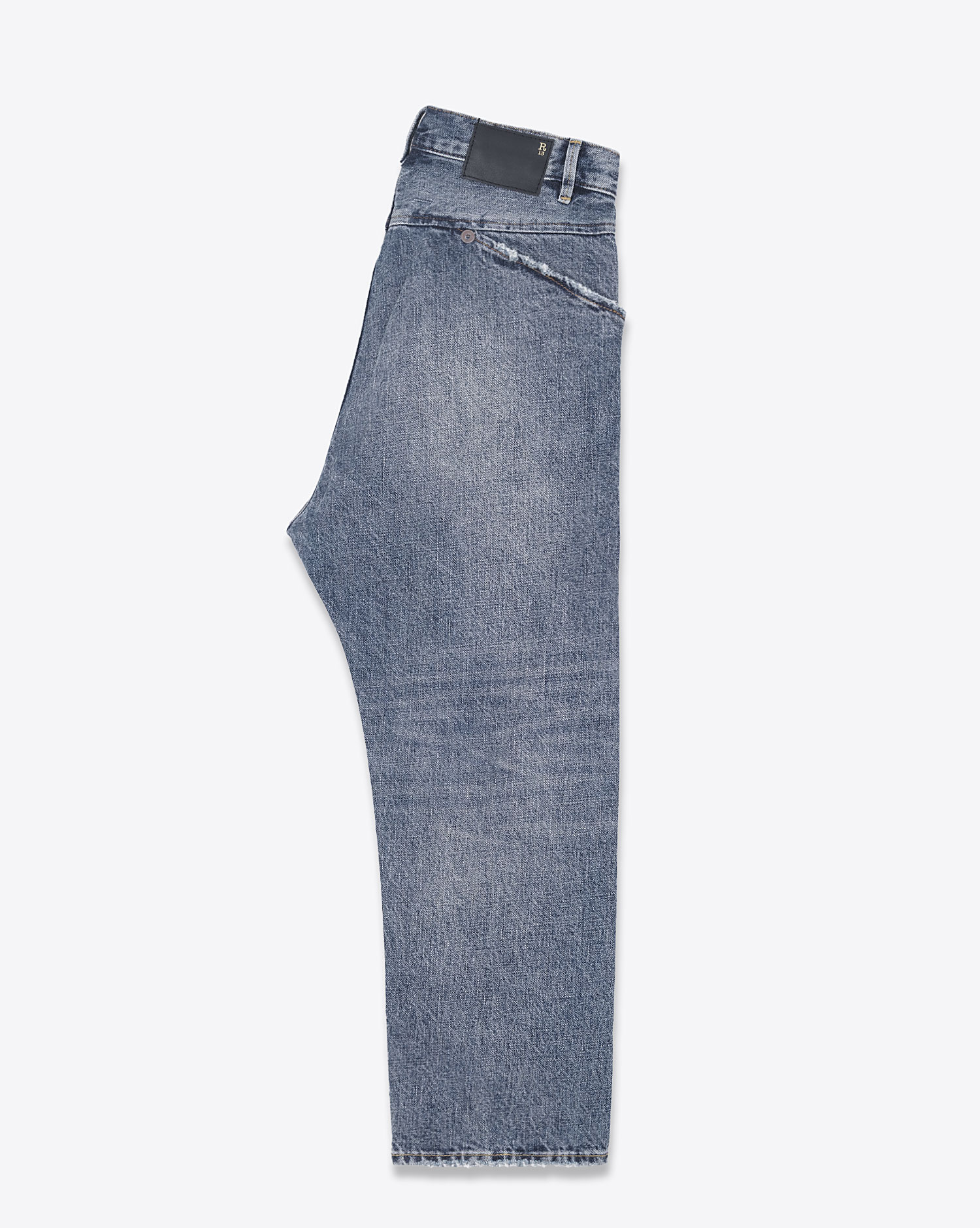 Jean Baggy fermeture croisée Exene en denim bleu Barter Indigo R13 Denim. Détail de la poche arrière en biais. Profil.