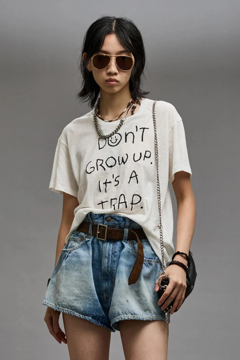 Tee-shirt manches courtes blanc à message "Don't Grow Up It's A Trap" R13. 