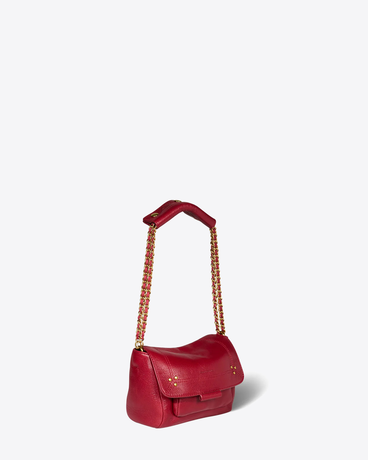 Sac Lulu S Jérôme Dreyfuss en cuir rouge. Vu profil avec bandoulière. 