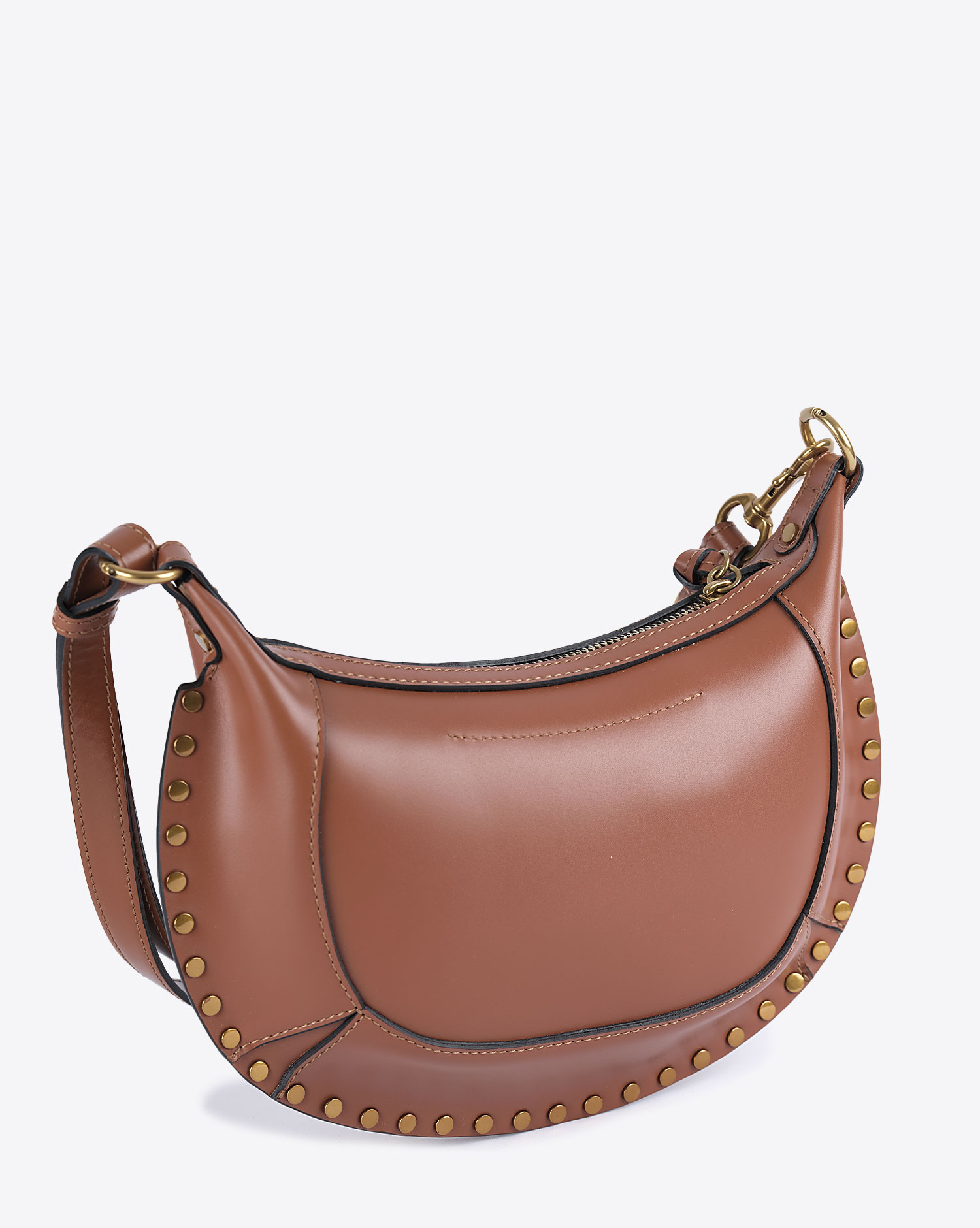 Sac lune Oskan Isabel Marant en cuir de veau cognac. Vue profil.